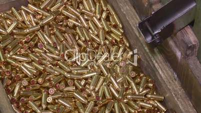 Ammunition factory , bullets for rifle on production line