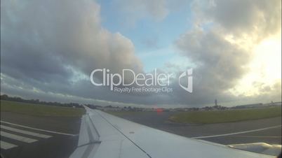 View Of Wing Out From Flying Airplane Taking Off from  Heathrow, London