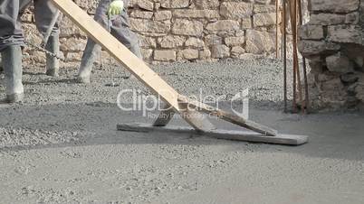 Spreading concrete, compacting liquid cement