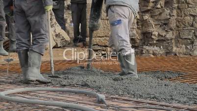 Concrete pouring works, compacting liquid cement