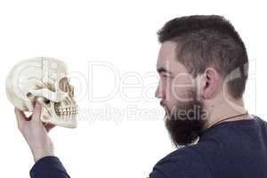 Bearded man with a skull
