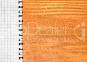 Notepad on a wooden background