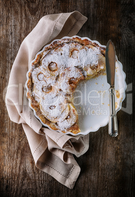 Apple pie on wooden table
