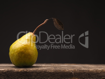 Organic pear on a wooden table