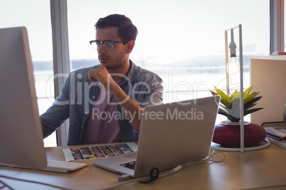 Businessman working on computer at office