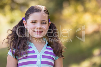 Portrait of cute girl on sunny day
