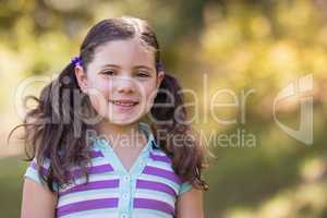 Portrait of cute girl on sunny day