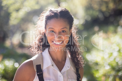 Portrait of happy female hiker