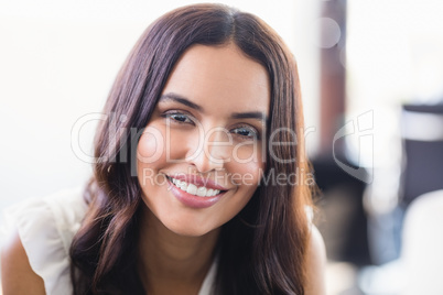 Close up portrait of smiling businesswoman