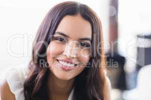 Close up portrait of smiling businesswoman