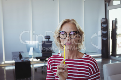 Thoughtful entrepreneur wearing eyeglasses