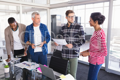 Business colleagues discussing at office