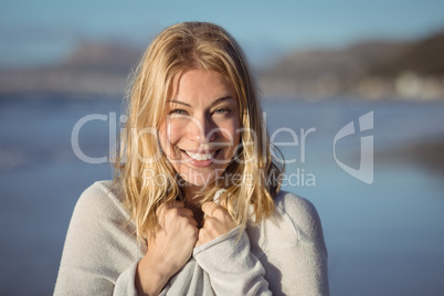 Portrait of smiling woman at beach