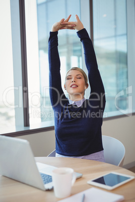 Executive stretching her hands