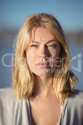 Portrait of serious woman at beach