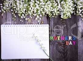 Abstract wooden background with festive inscription mother's day