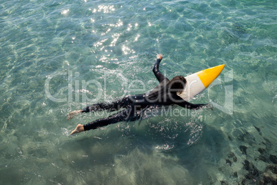 Surfer surfing in the sea