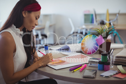 Side view of entrepreneur in creative office