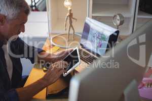 businessman using digital tablet at creative office