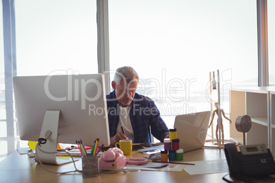 Focused businessman working at office