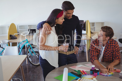 Young business people discussing at office