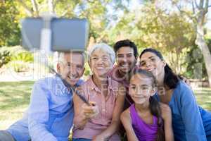 Family taking a selfie in the park