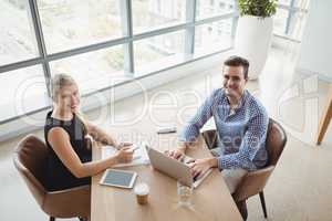 Overhead view of executives working at desk