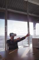 Businessman testing virtual reality technology