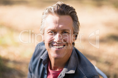 Portrait of smiling man on sunny day