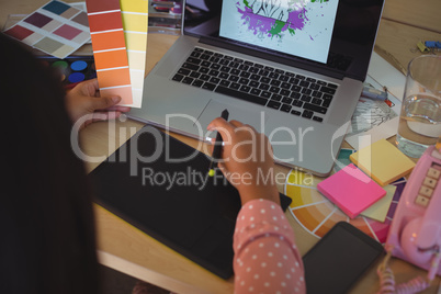 HIgh angke view of businesswoman working at office