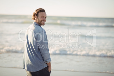 Portrait of smiling young man beach