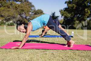 Portrait of happy girl practicing yoga