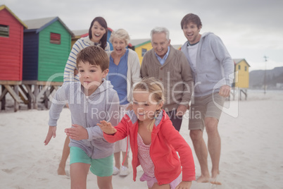 Happy multi-generation family at beach