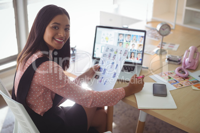High angle portrait of businesswoman working at office