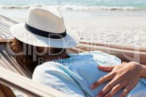 Man relaxing in hammock