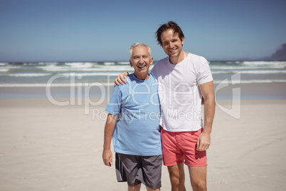 Portrait of smiling family at beach