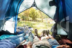 Family sleeping in the tent