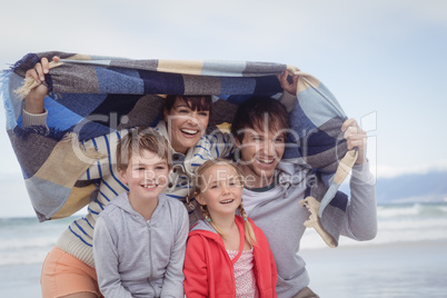 Portrait of happy family during winter