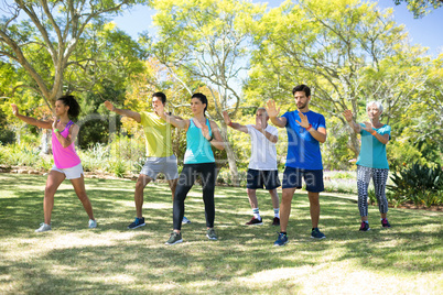 Group of people exercising in the park