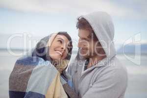 Young couple smiling during winter
