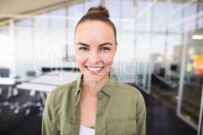 Portrait of businesswoman smiling in office