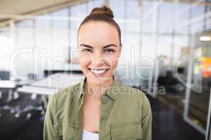 Portrait of businesswoman smiling in office