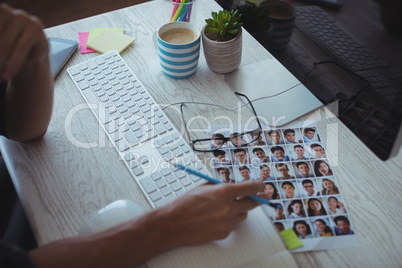 Businessman working at creative office desk