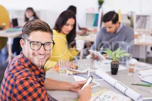 Smiling businessman with colleague