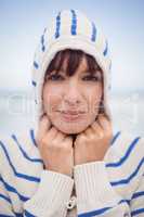 Close up portrait of woman wearing hooded sweater during winter