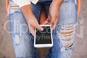 Overhead view of businesswoman using phone