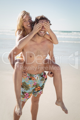 Happy couple enjoying at beach