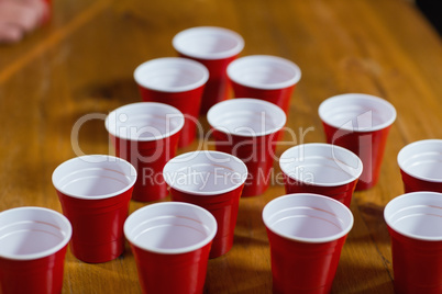 Empty disposable cups on table