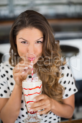 Portrait of woman having drink