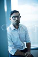 Portrait of thoughtful businessman at office